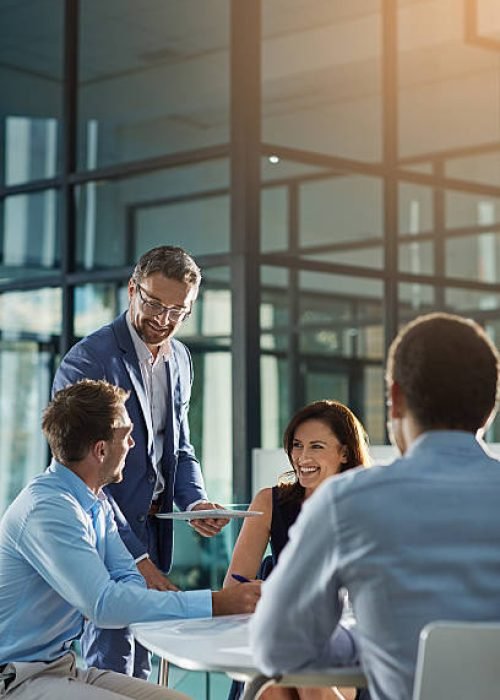 Shot of businesspeople having an office meeting Shot of businesspeople having an office meeting